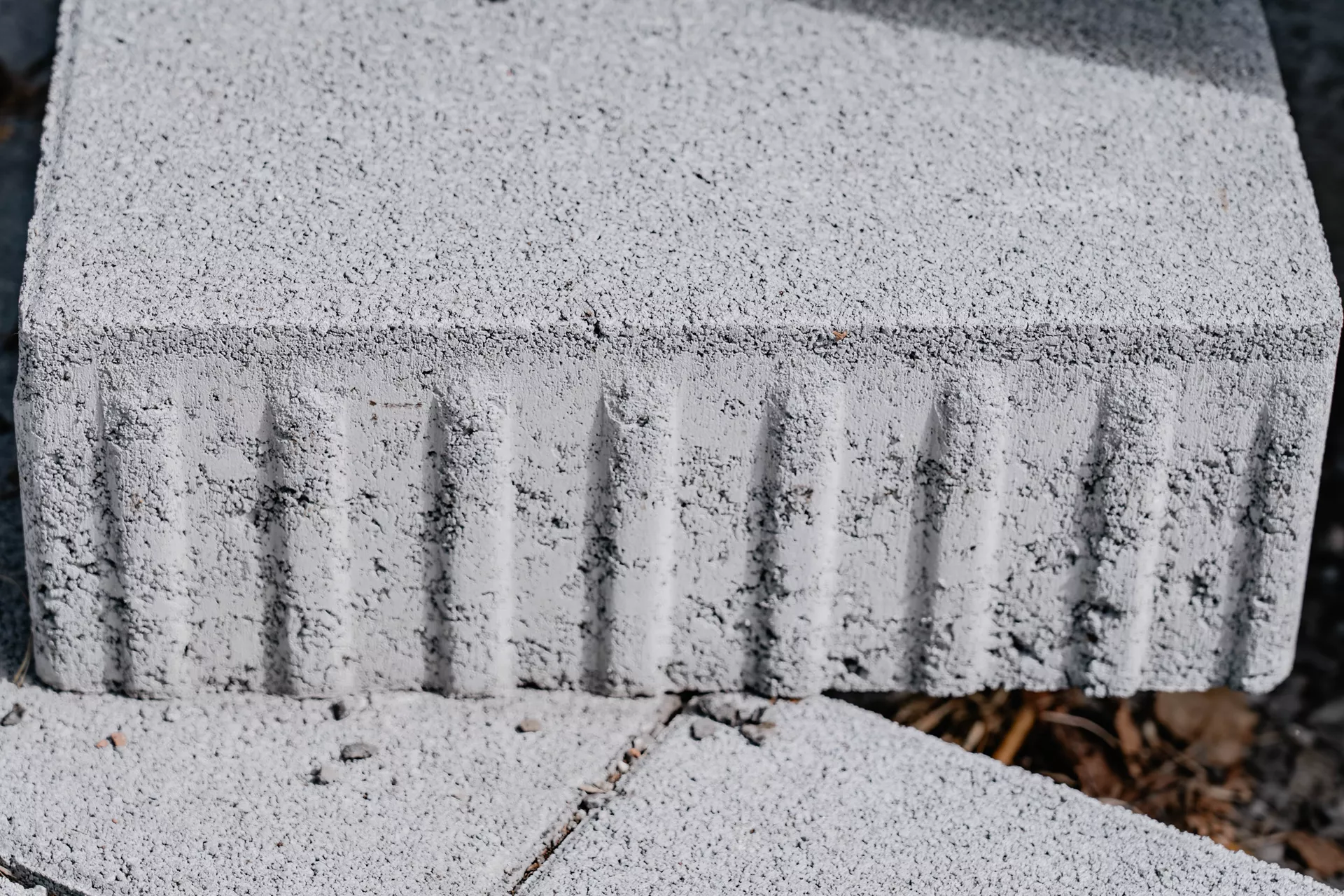 VS 5 Schwerlaststein mit Verschiebesicherung grau glatt gefast L 15 cm B 15 cm H 10.8 cm