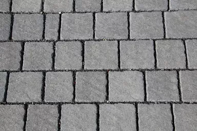 FRIEDA DRAIN Ökostein perlgrau strukturiert Kanten gebrochen L 13.8-16.8 cm B 15.1 cm H 7 cm