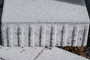 VS 5 Schwerlaststein mit Verschiebesicherung grau glatt gefast L 15 cm B 15 cm H 10.8 cm