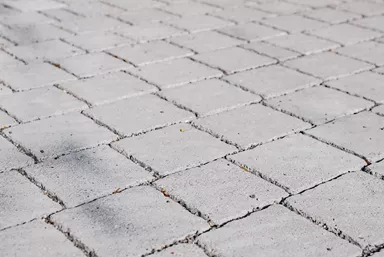 FRIEDA DRAIN Ökostein perlgrau strukturiert Kanten gebrochen L 13.8-16.8 cm B 15.1 cm H 7 cm