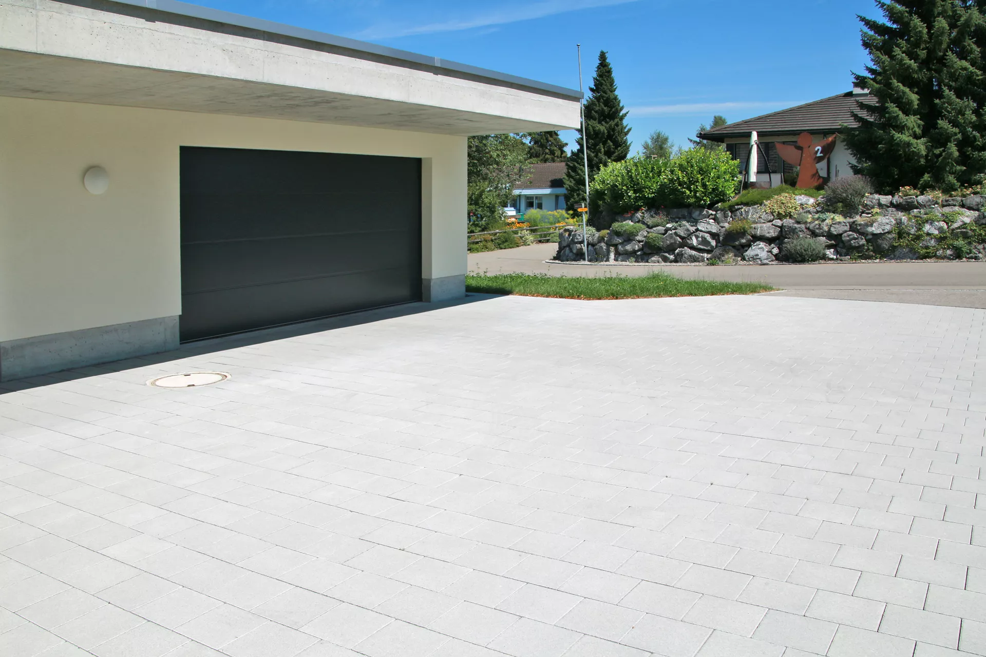 CARENA Pflasterstein mit Nockenverbund grau glatt gefast L 25 cm B 25 cm H 8 cm