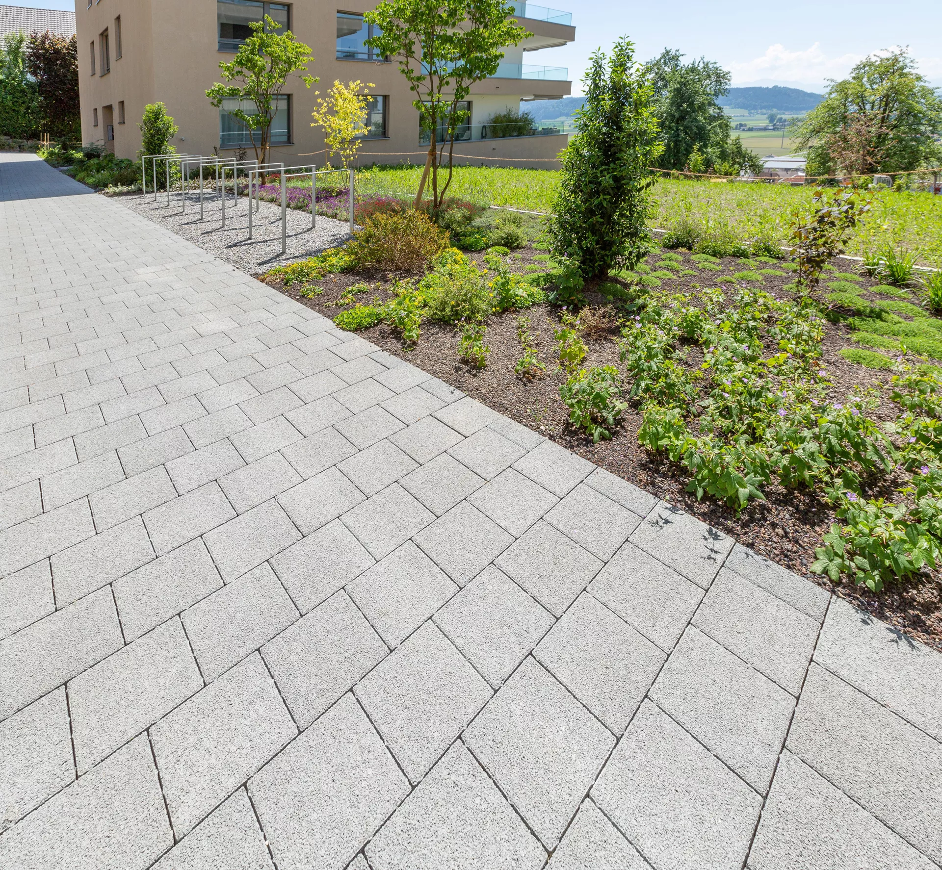 CARENA Sickerstein fino mit Nocken grau haufwerksporig gefast L 25 cm B 25 cm H 6 cm