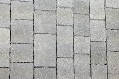 FRIEDA Pflasterstein perlgrau strukturiert Kanten gebr. L 8.8-11.8 cm B 9.8 cm H 7 cm