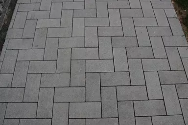 CARENA Pflasterstein mit Nockenverbund grau glatt vollkantig L 25 cm B 12.5 cm H 6 cm