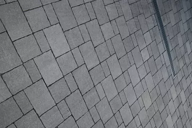 FRIEDA Pflasterstein perlgrau strukturiert Kanten gebr. L 8.8-11.8 cm B 9.8 cm H 7 cm