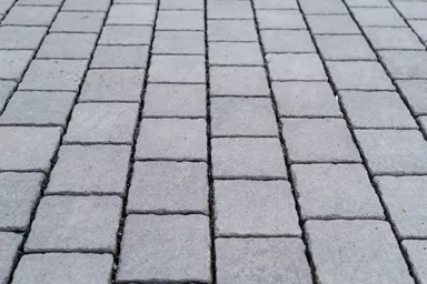 FRIEDA DRAIN Ökostein perlgrau strukturiert Kanten gebrochen L 13.8-16.8 cm B 15.1 cm H 7 cm